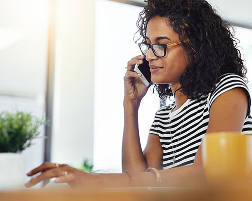 Woman of colour on the phone