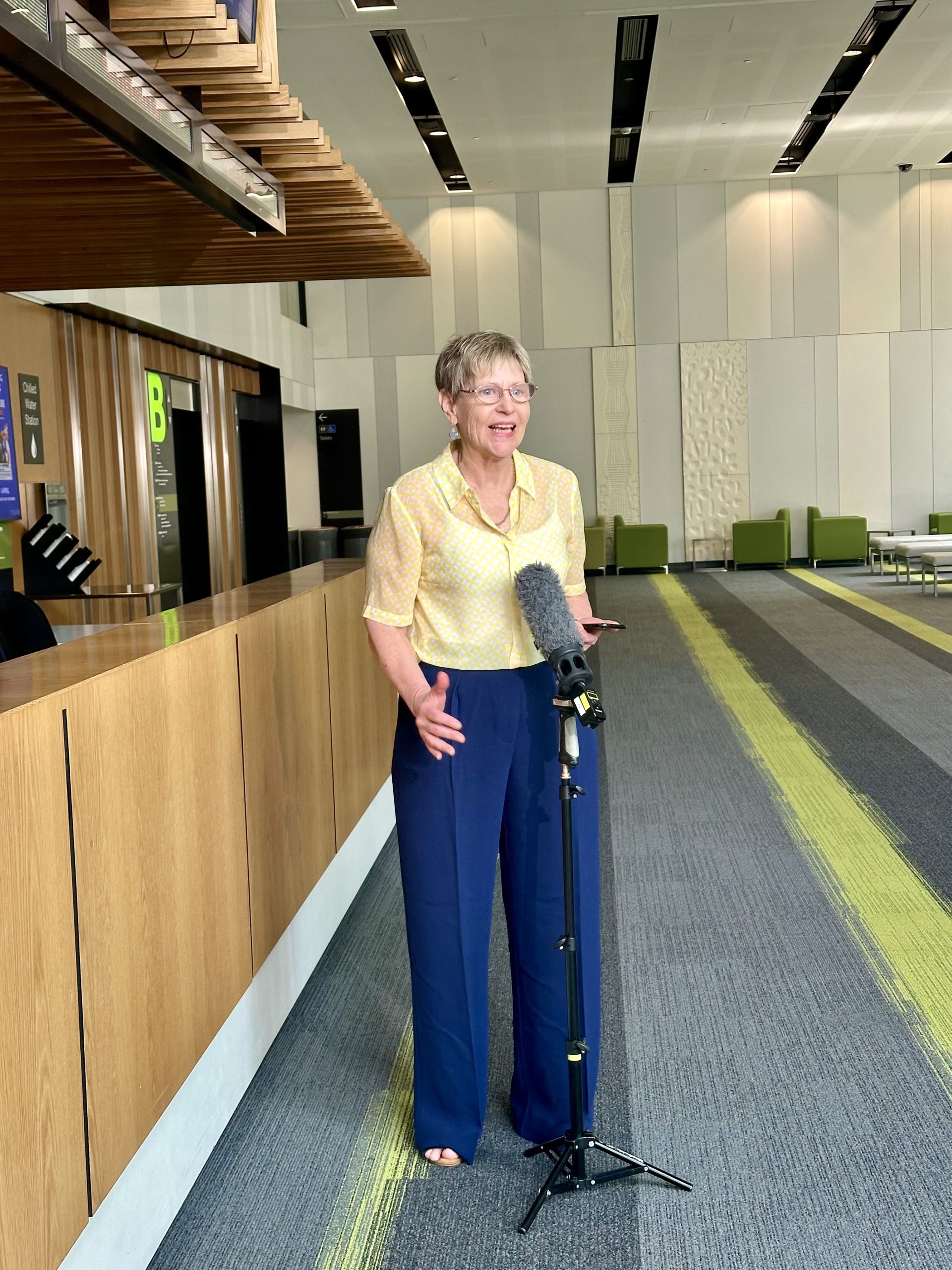 Former Executive Director Julie Price speaking to media about the pay rise for educators